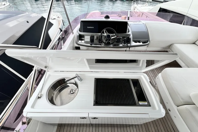  Yacht Photos Pics Luxury yacht Princess F55 2021 helm with sink and grill on deck.