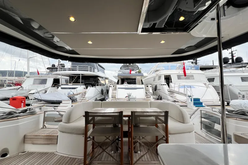  Yacht Photos Pics Luxurious 2021 Princess F55 yacht interior with marina view and elegant seating area.
