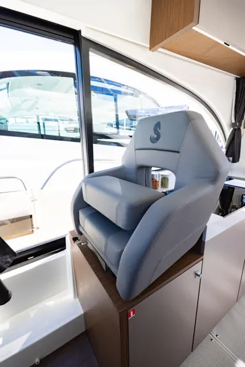  Yacht Photos Pics Captain's chair on 2026 Beneteau Antares 11 yacht, featuring sleek design and comfort.