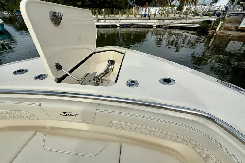  Yacht Photos Pics 2026 Scout 288 LXF boat with open anchor compartment at dockside.