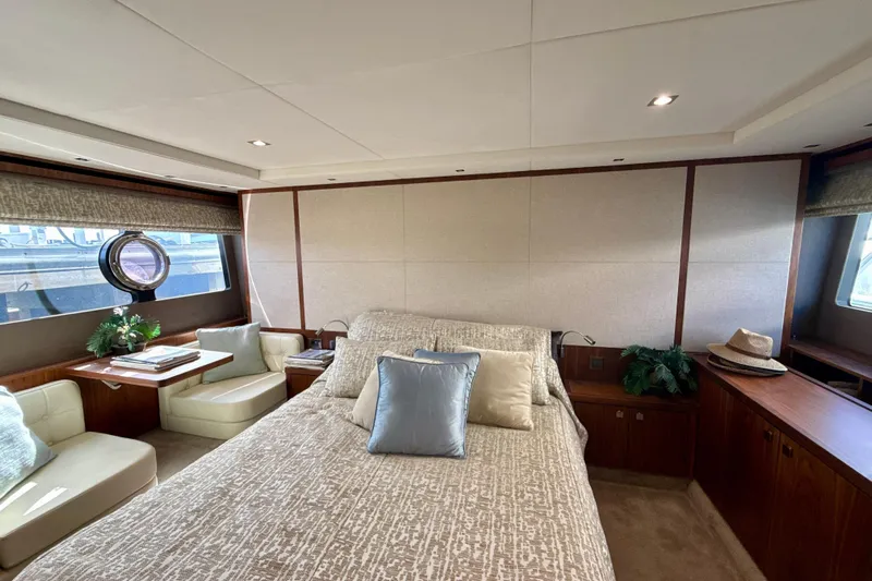 Wine Tyme Yacht Photos Pics Luxurious interior of 2016 Sunseeker Predator 57 yacht bedroom with elegant decor.