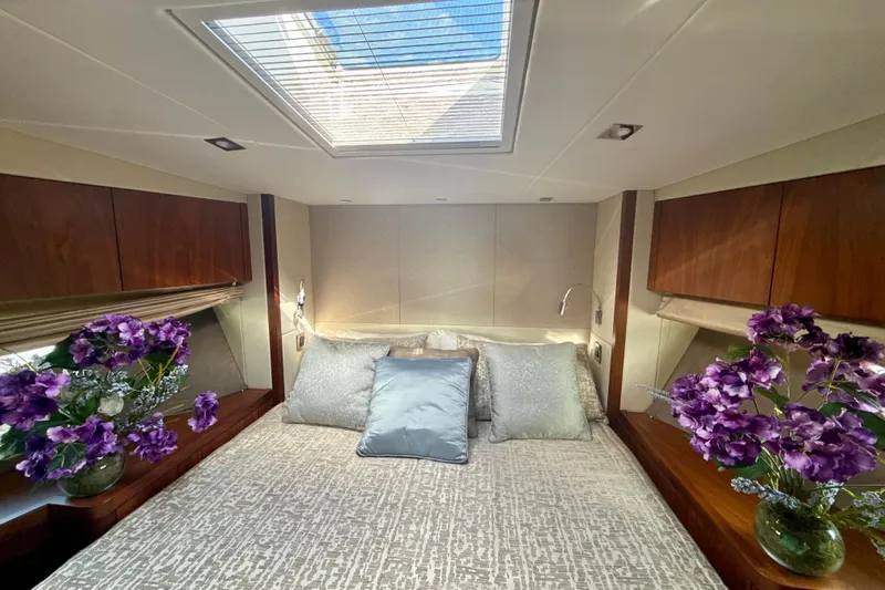 Wine Tyme Yacht Photos Pics Luxurious Sunseeker Predator 57 yacht bedroom with skylight and elegant floral decor, 2016 model.