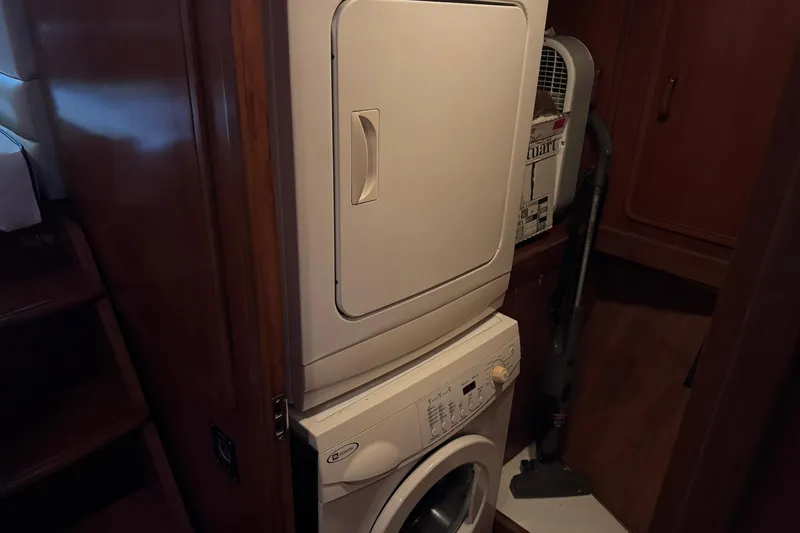 Sandial Yacht Photos Pics Stacked washer and dryer in 1991 DeFever 44 yacht interior.