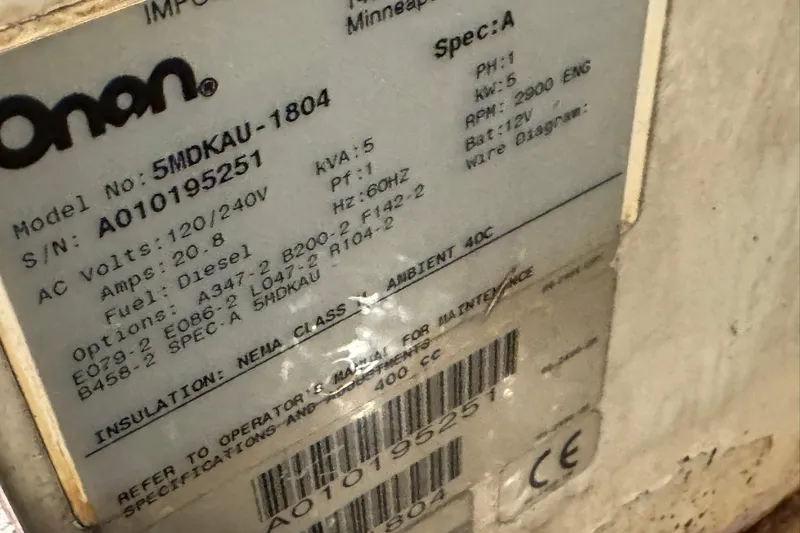 Sandial Yacht Photos Pics Label on Onan generator, model 5MDKAU-1804, serial A010195251, for DeFever 44, 1991.