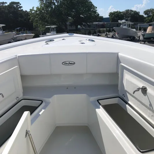  Yacht Photos Pics 2026 Pair Customs 24 Center Console DV boat interior with storage compartments.