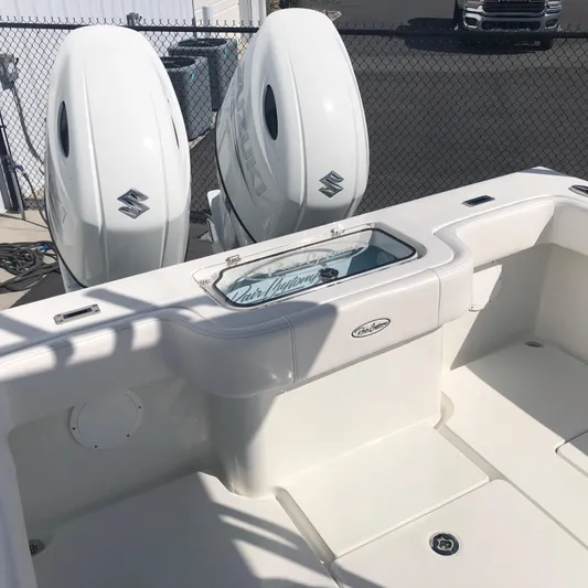  Yacht Photos Pics 2026 Pair Customs 24 Center Console DV boat with dual Suzuki outboard engines.
