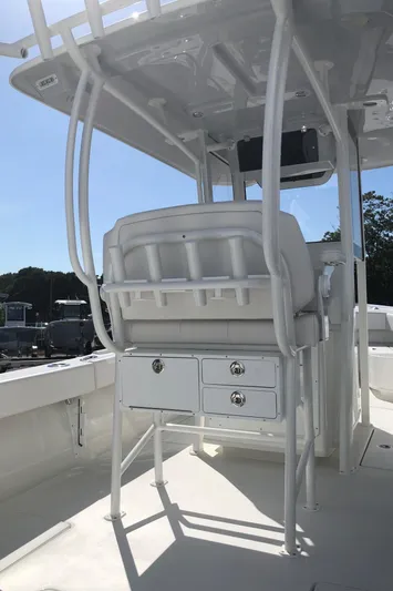  Yacht Photos Pics 2026 Pair Customs 24 Center Console DV boat interior with seating and storage.