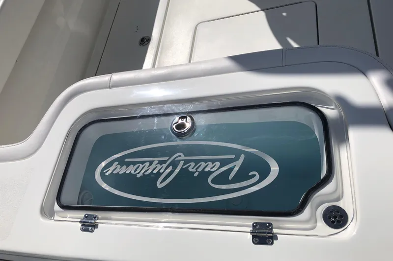  Yacht Photos Pics 2026 Pair Customs 24 Center Console DV boat detail with logo on hatch.