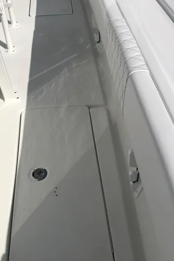  Yacht Photos Pics 2026 Pair Customs 24 Center Console DV boat deck with sleek design and white finish.