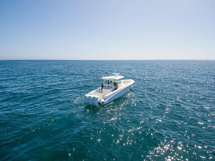 Nothing But Net Yacht Photos Pics Boston Whaler 350 Outrage 2016 on open sea.