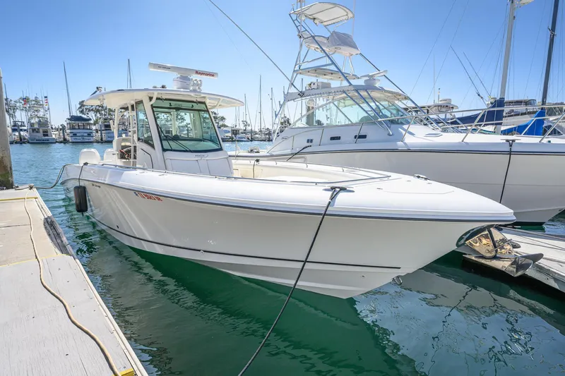 Nothing But Net Yacht Photos Pics 2016 Boston Whaler 350 Outrage docked, sunny day.