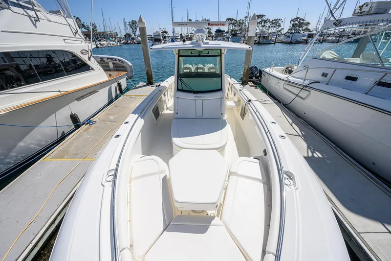 Nothing But Net Yacht Photos Pics Boston Whaler 350 Outrage 2016 docked at marina.
