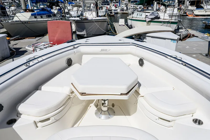 Nothing But Net Yacht Photos Pics 2016 Boston Whaler 350 Outrage with seating area in harbor.