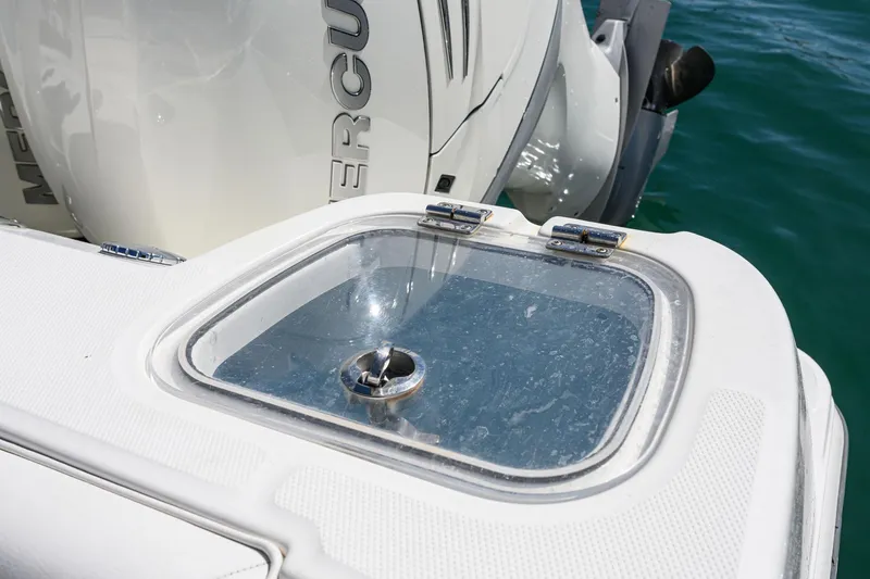 Nothing But Net Yacht Photos Pics Boston Whaler 350 Outrage 2016, deck detail with engine.