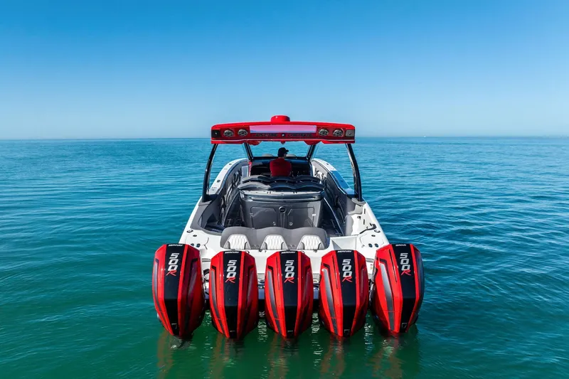  Yacht Photos Pics 2024 MTI V42 boat with five powerful outboard engines on open water.