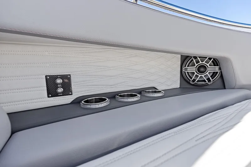  Yacht Photos Pics Luxury interior of 2024 MTI V42 boat with speaker and cup holders.