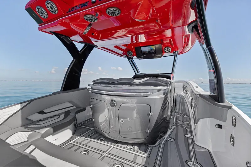  Yacht Photos Pics 2024 MTI V42 boat interior with sleek design, red canopy, and advanced navigation system.