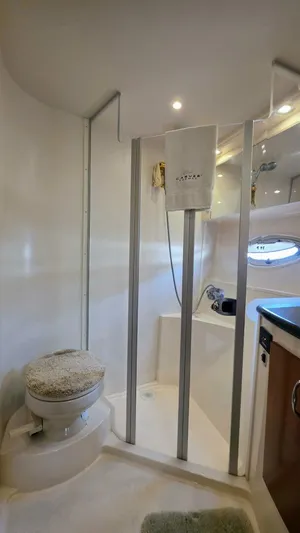  Yacht Photos Pics Bathroom interior of 2005 Carver 36 Mariner yacht, featuring shower and toilet.