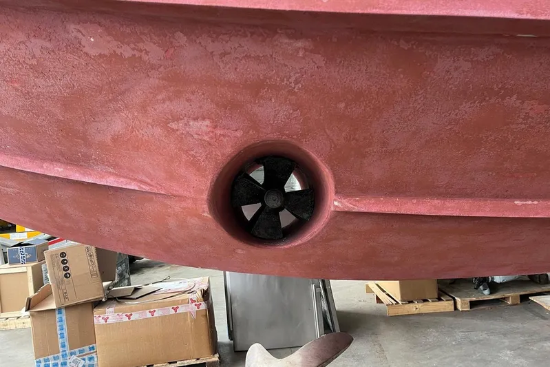  Yacht Photos Pics Bottom view of 2004 Maiora 24 S yacht hull with visible thruster.