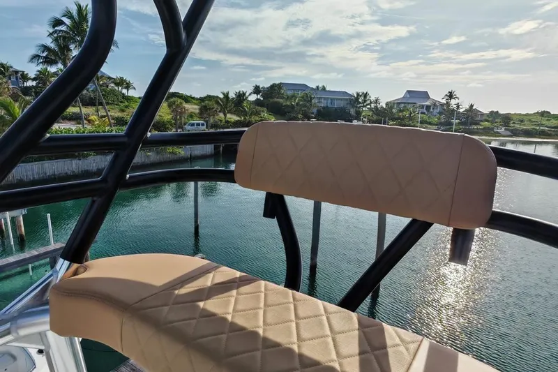  Yacht Photos Pics Luxurious seating on a 2025 Freeman 42 boat, overlooking serene waterfront scenery.