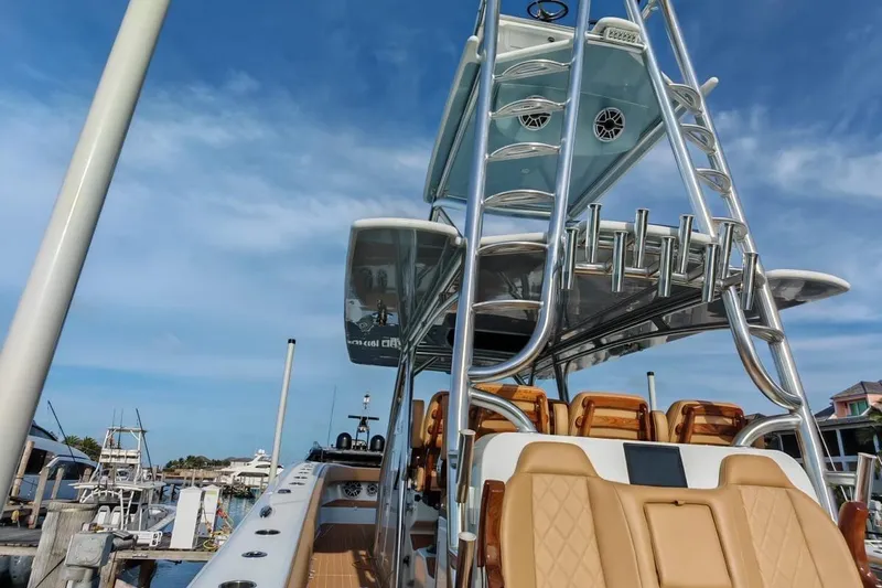  Yacht Photos Pics 2025 Freeman 42 boat with luxurious seating and sleek design at a marina.