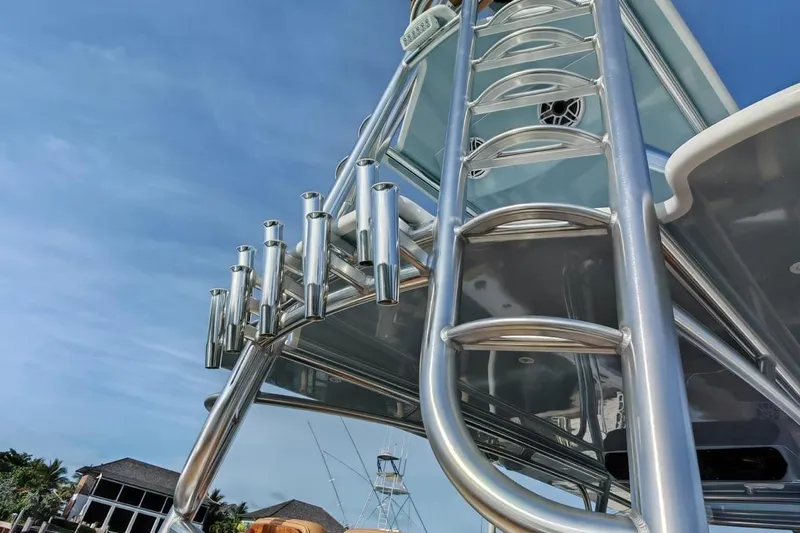  Yacht Photos Pics Freeman 42 boat ladder and rod holders against a clear blue sky, 2025 model.