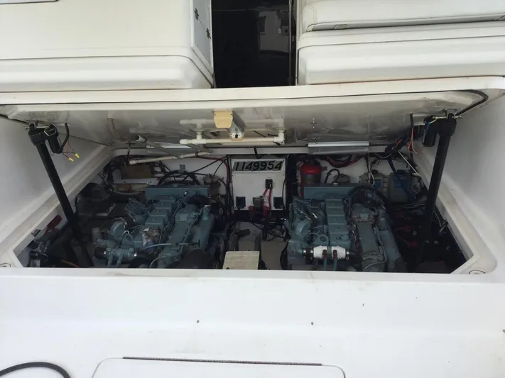  Yacht Photos Pics 1998 Tiara Yachts 3500 Open engine compartment with dual engines visible.