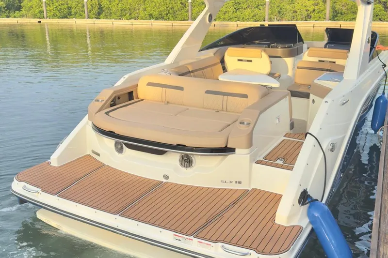 2017 Sea Ray 310 Slx @ Puerto Vallarta "bella" Yacht Photos Pics 2017 Sea Ray 310 SLX luxury boat with spacious seating and elegant design on calm water.