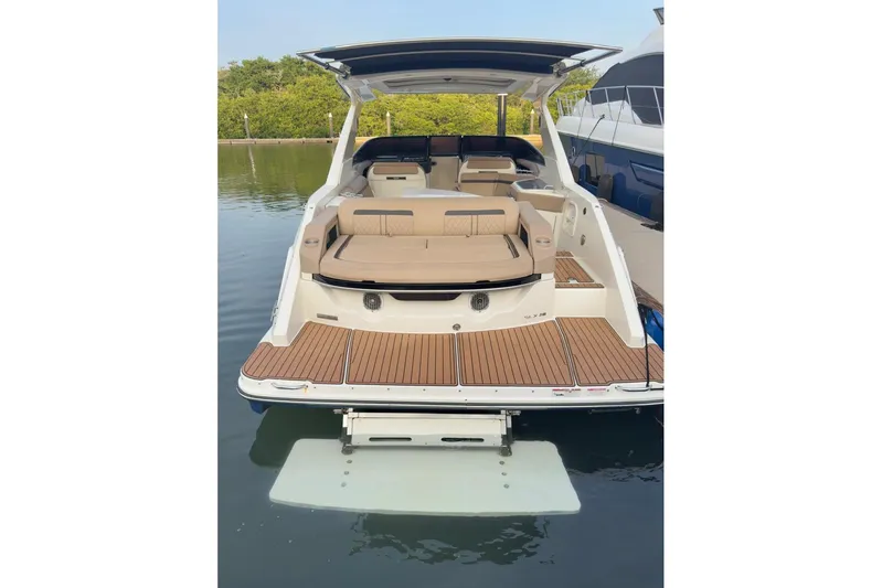2017 Sea Ray 310 Slx @ Puerto Vallarta "bella" Yacht Photos Pics 2017 Sea Ray 310 SLX boat with spacious seating and swim platform in calm waters.