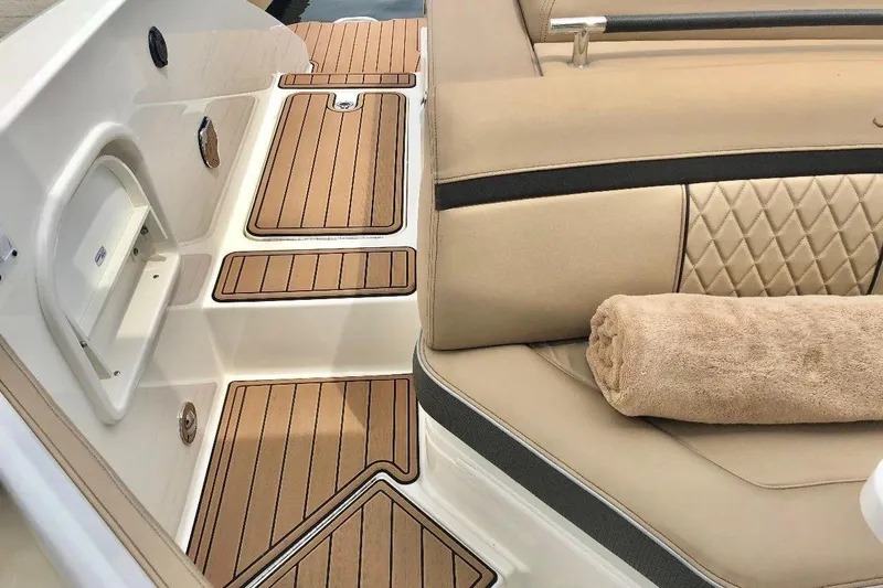 2017 Sea Ray 310 Slx @ Puerto Vallarta "bella" Yacht Photos Pics Luxurious interior of 2017 Sea Ray 310 SLX boat with tan seating and teak flooring.