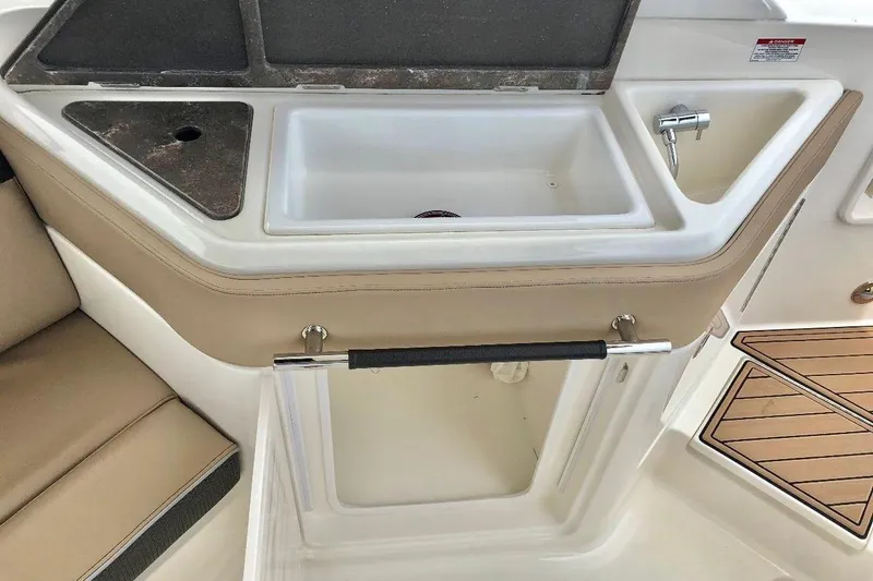 2017 Sea Ray 310 Slx @ Puerto Vallarta "bella" Yacht Photos Pics 2017 Sea Ray 310 SLX boat interior with sink and seating area.