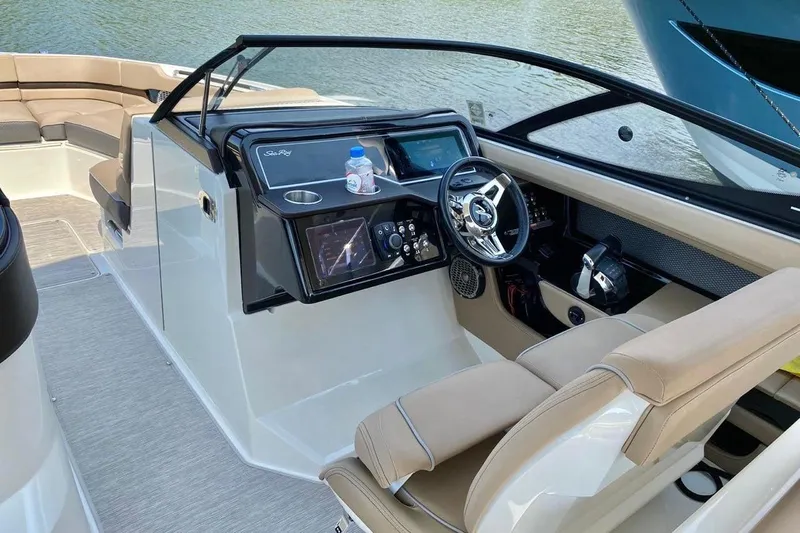 2017 Sea Ray 310 Slx @ Puerto Vallarta "bella" Yacht Photos Pics 2017 Sea Ray 310 SLX boat interior with helm, steering wheel, and seating.