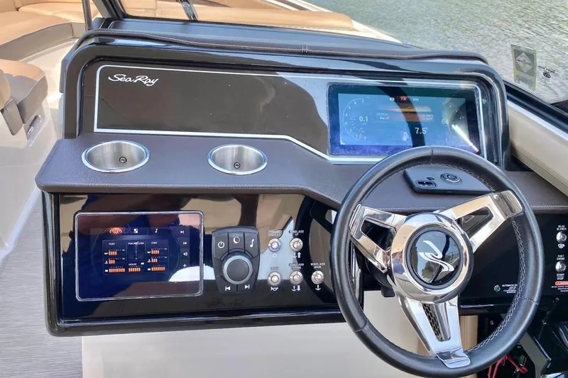 2017 Sea Ray 310 Slx @ Puerto Vallarta "bella" Yacht Photos Pics 2017 Sea Ray 310 SLX dashboard with steering wheel and digital display.