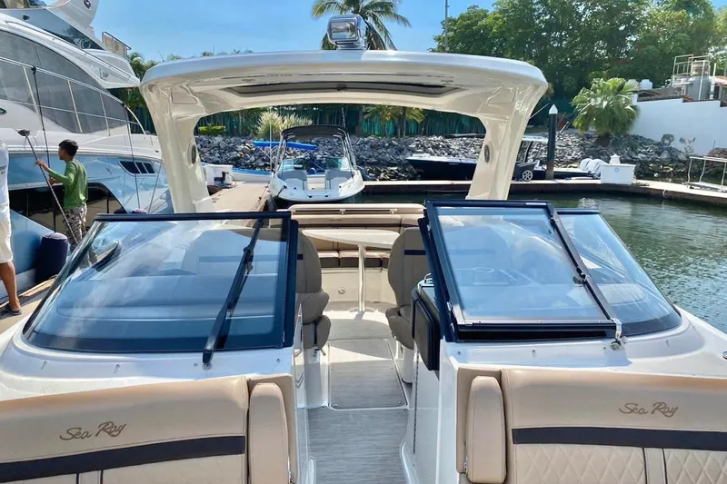 2017 Sea Ray 310 Slx @ Puerto Vallarta "bella" Yacht Photos Pics 2017 Sea Ray 310 SLX boat docked at marina with open seating area.