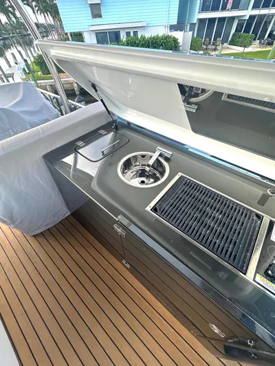 American Dream Yacht Photos Pics Outdoor kitchen on 2023 Schaefer 660 yacht with grill and sink.