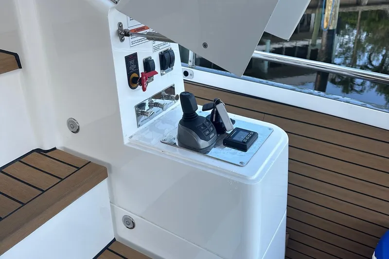 American Dream Yacht Photos Pics Control panel on 2023 Schaefer 660 yacht with joystick and switches.