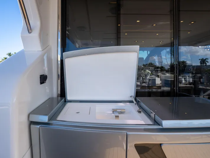 American Dream Yacht Photos Pics Outdoor kitchenette on 2023 Schaefer 660 yacht with sleek design and modern amenities.