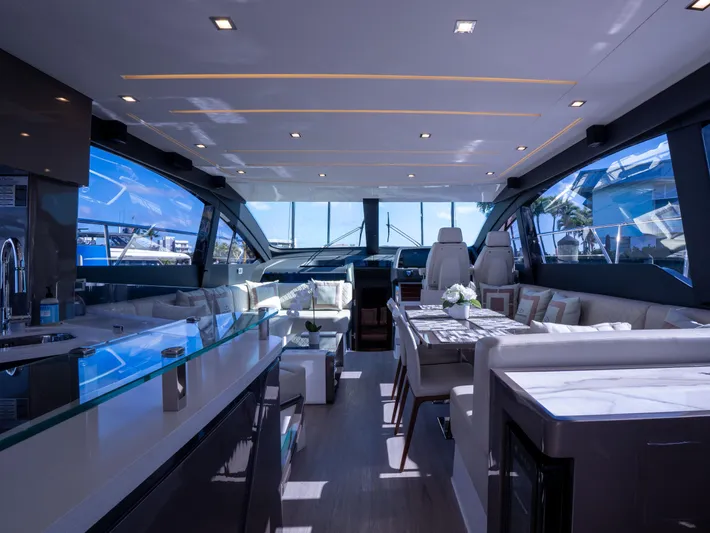 American Dream Yacht Photos Pics Luxurious interior of 2023 Schaefer 660 yacht with modern design and spacious seating.