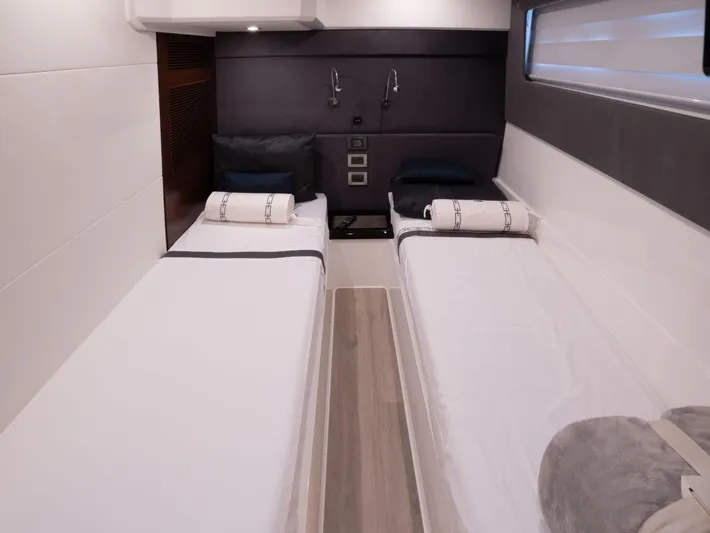 American Dream Yacht Photos Pics Interior of 2023 Schaefer 660 yacht cabin with twin beds and modern design.