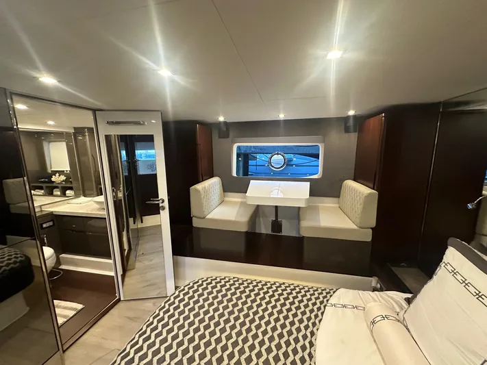 American Dream Yacht Photos Pics Luxurious interior of 2023 Schaefer 660 yacht with modern seating and elegant decor.