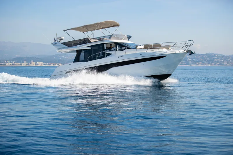  Yacht Photos Pics 2021 Galeon 460 Fly yacht cruising on open water.
