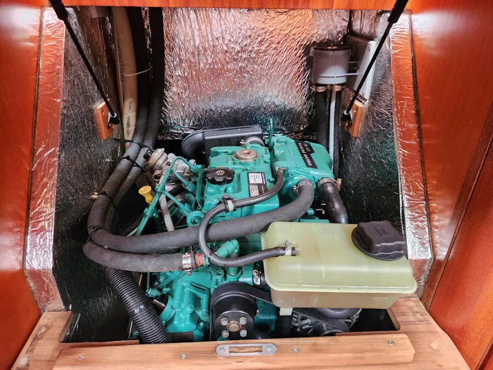 Ceres Yacht Photos Pics Engine compartment of a 2016 Hallberg-Rassy 342 sailboat, featuring a well-maintained marine engine.