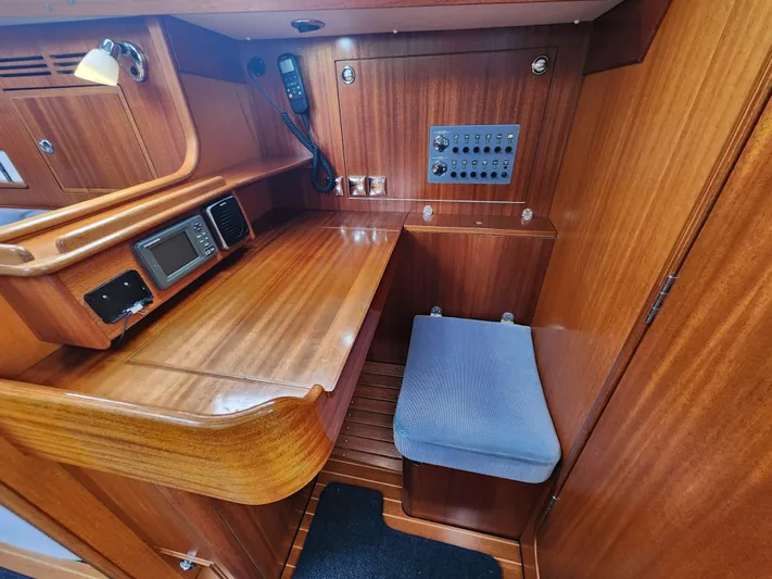 Ceres Yacht Photos Pics 2016 Hallberg-Rassy 342 yacht interior with navigation station and control panel.