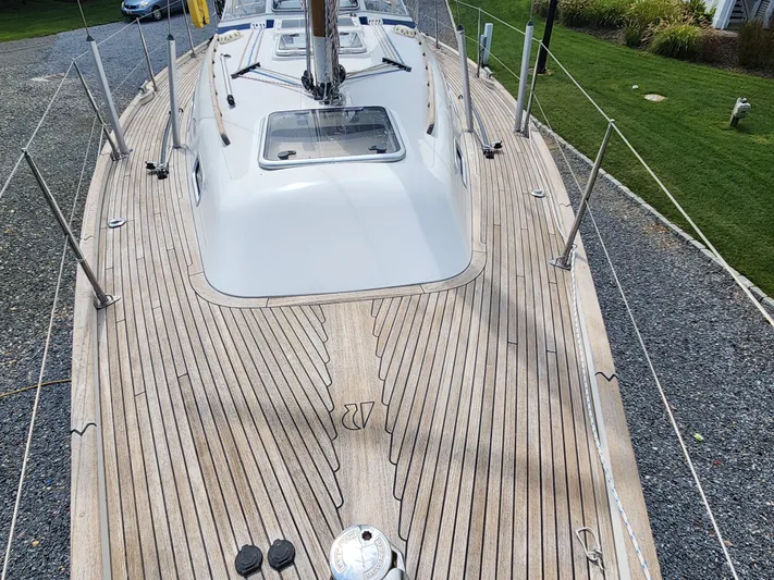 Ceres Yacht Photos Pics Deck view of 2016 Hallberg-Rassy 342 sailboat with teak finish and sleek design.