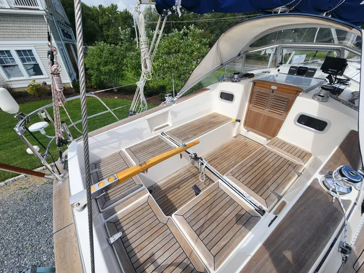 Ceres Yacht Photos Pics 2016 Hallberg-Rassy 342 sailboat cockpit with teak flooring and steering wheel.