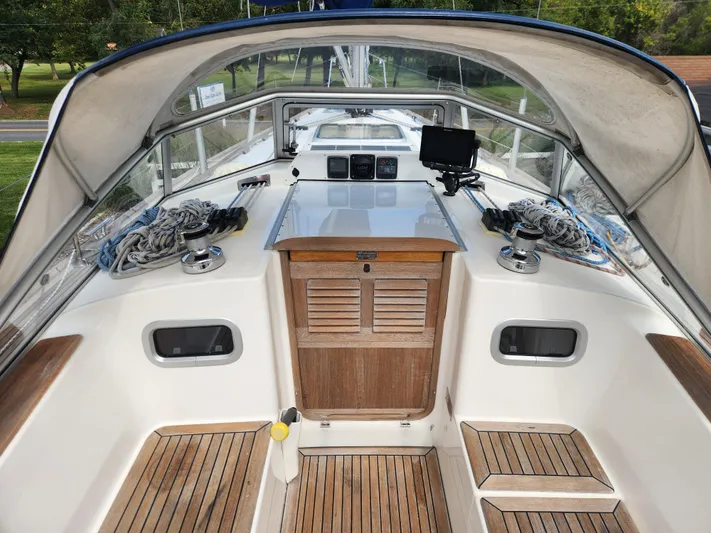 Ceres Yacht Photos Pics Hallberg-Rassy 342 sailboat cockpit, 2016 model, featuring teak flooring and navigation equipment.