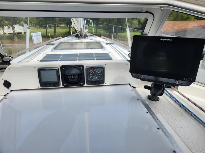 Ceres Yacht Photos Pics 2016 Hallberg-Rassy 342 yacht cockpit with navigation instruments and Raymarine display.