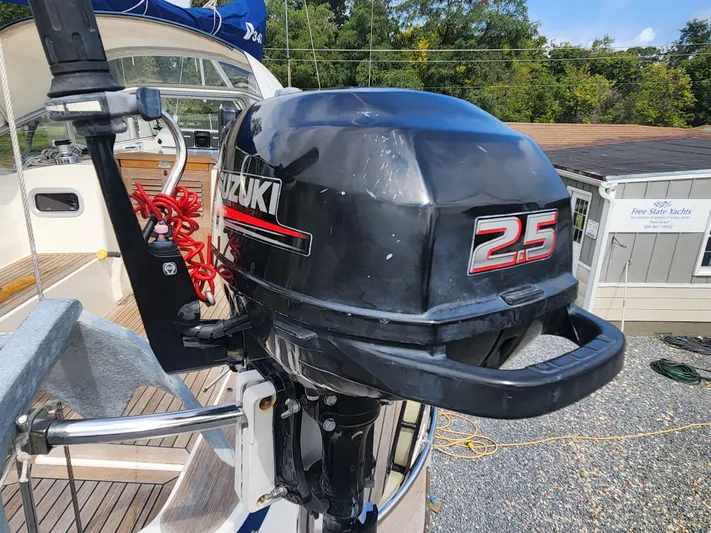 Ceres Yacht Photos Pics Suzuki 2.5 outboard motor on 2016 Hallberg-Rassy 342 sailboat deck.