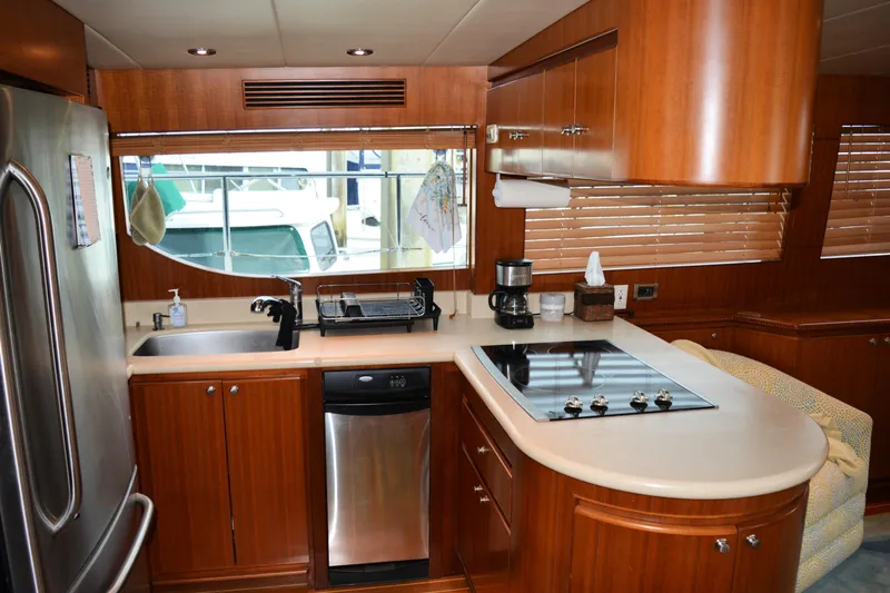 Wandra Yacht Photos Pics Luxurious kitchen interior of 2008 Novatec Islander 60 yacht with modern appliances.