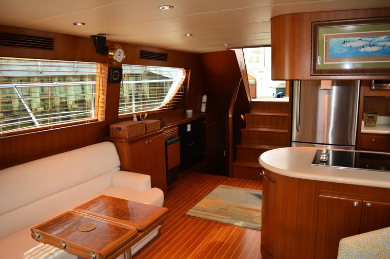 Wandra Yacht Photos Pics Luxurious interior of 2008 Novatec Islander 60 yacht with modern kitchen and seating area.